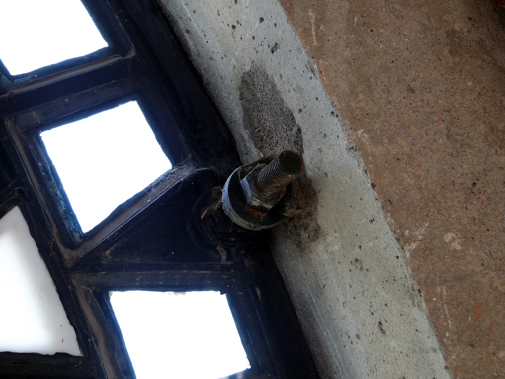 One of the bolts holding the clock face